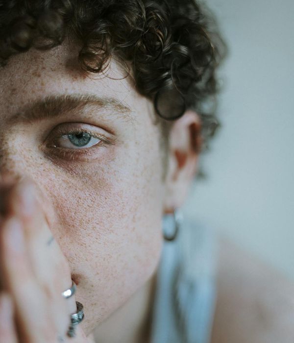 Focused person working in deep concentration with minimal distractions